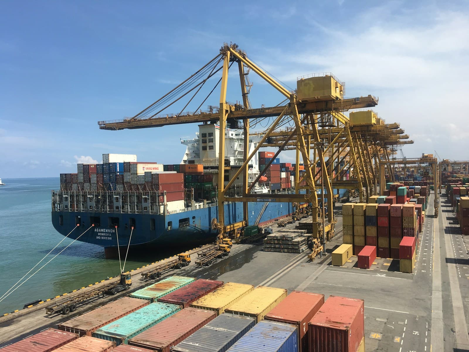 A container ship alongside the cranes at the Port of Colombo